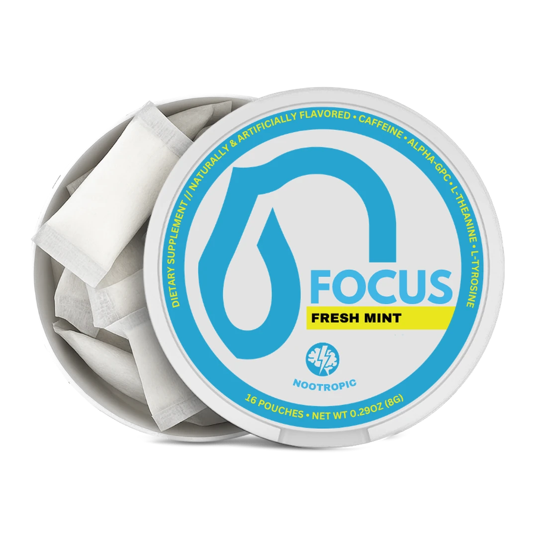 An open round tin of Nootropic Focus Fresh Mint dietary supplement pouches, showing several white single-serve packets inside against a clean white background.