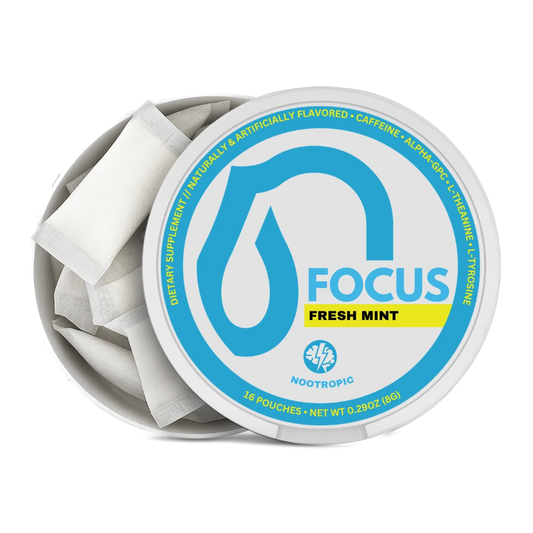 An open round tin of Nootropic Focus Fresh Mint dietary supplement pouches, showing several white single-serve packets inside against a clean white background.