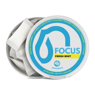 An open round tin of Nootropic Focus Fresh Mint dietary supplement pouches, showing several white single-serve packets inside against a clean white background.