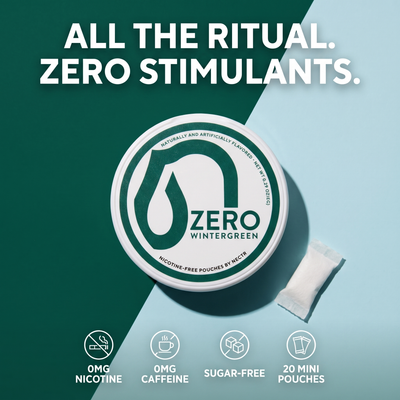 A round tin of Zero Wintergreen nicotine-free pouches sits on a split dark green and light blue background with large text reading 'ALL THE RITUAL. ZERO STIMULANTS.